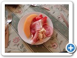 Platter of cold meat and melon
